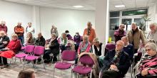 Teilnehmergruppe beim Vortrag "Herzinfarkt vermeiden"